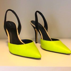 ALDO lime green and black pointed toe pumps